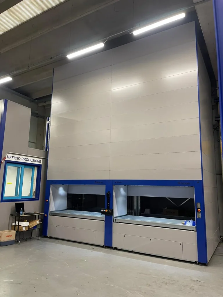 cospro, Soluzioni per Magazzini Automatici: sistemi verticali per stoccaggio efficiente in ambiente industriale.